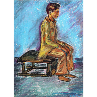 A MAN SITTING ON A TABLE